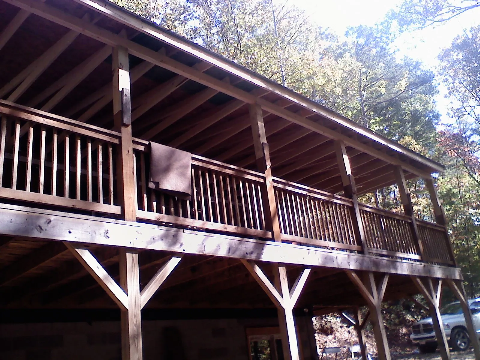 Timber framing under a new elevated porch and deck — Roof Leak Repair in Ekron by Roofing Brothers